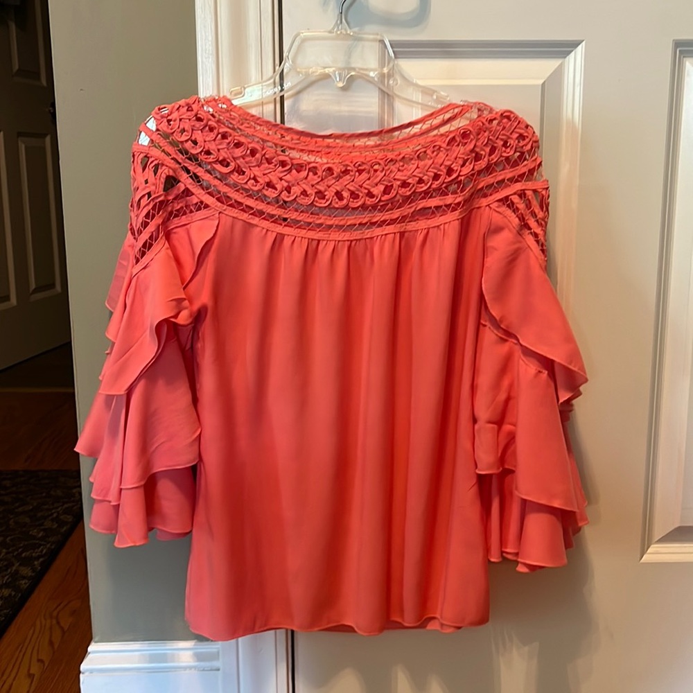 Women’s coral orange ruffle cotton blouse. Size M
